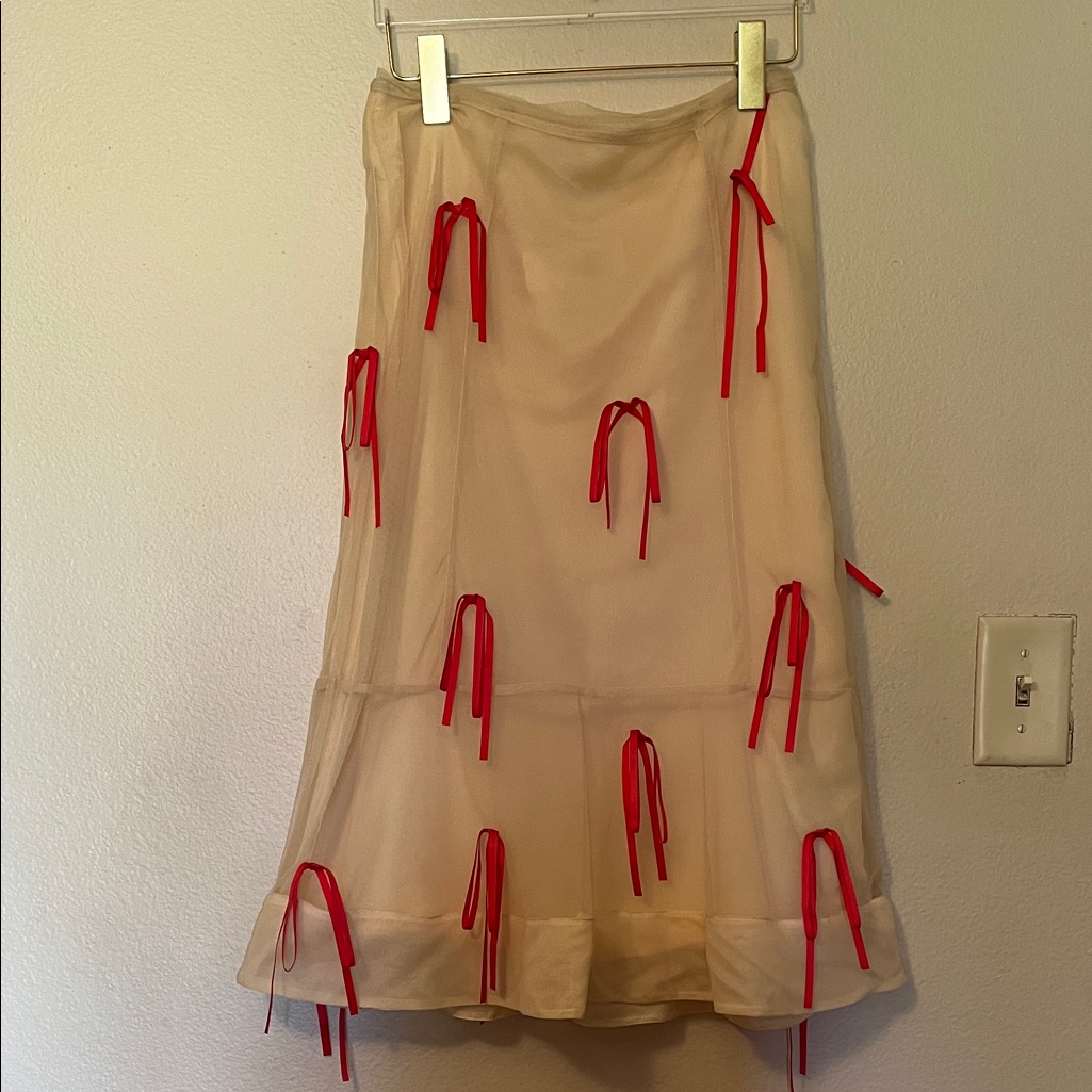 Anthropologie Cream Skirt With Red Bow Accents